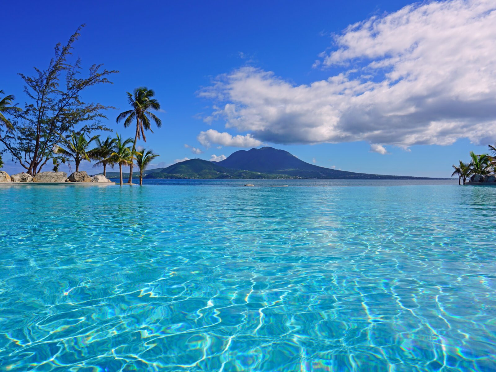View,Of,The,Nevis,Peak,Volcano,From,A,Swimming,Pool