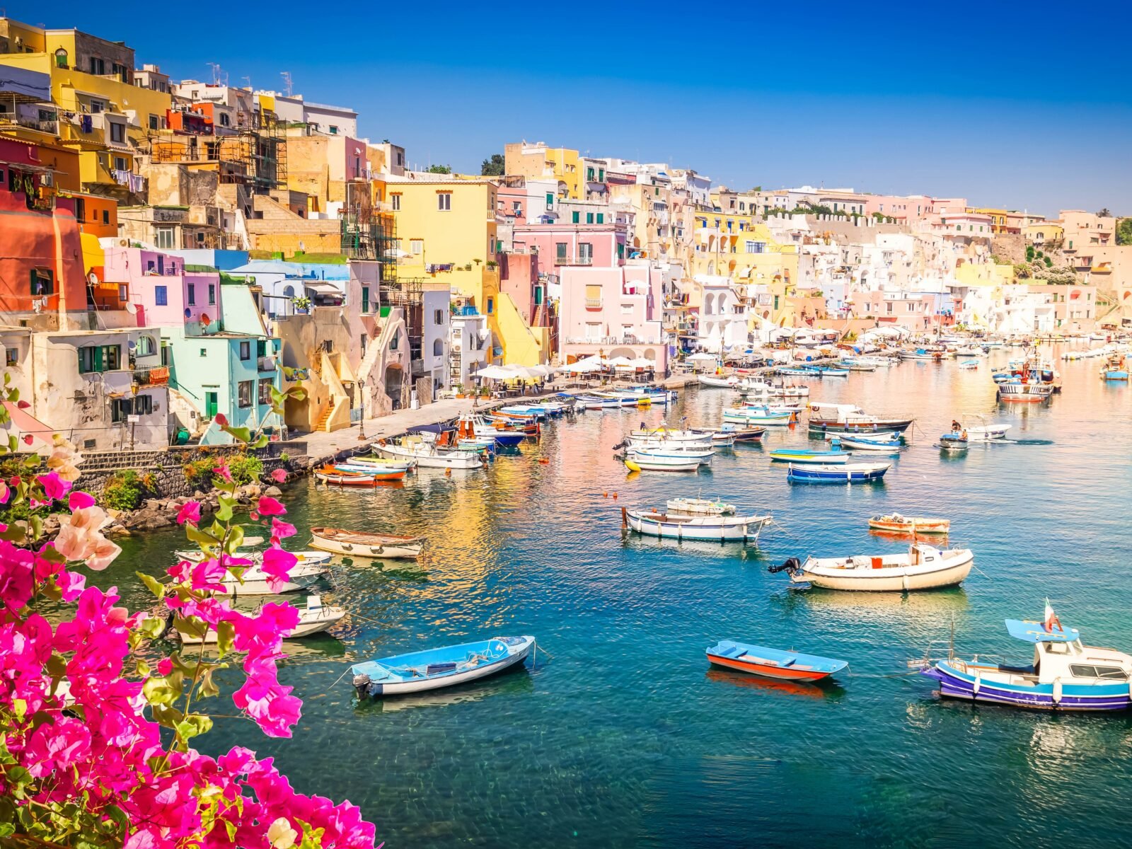 Procida,Island,Colorful,Town,With,Harbor,At,Summer,With,Flowers,