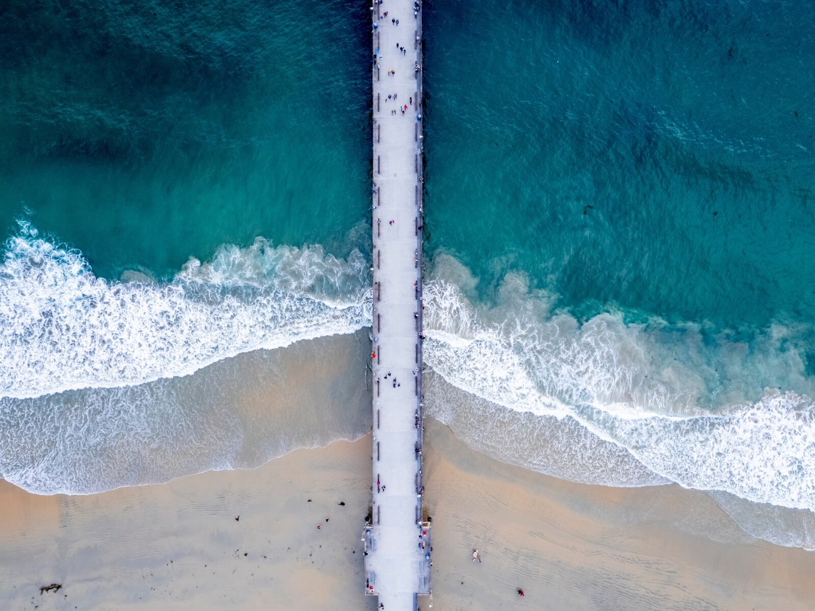 An,Aerial,View,Of,A,Long,Bridge,In,Newport,Beach,
