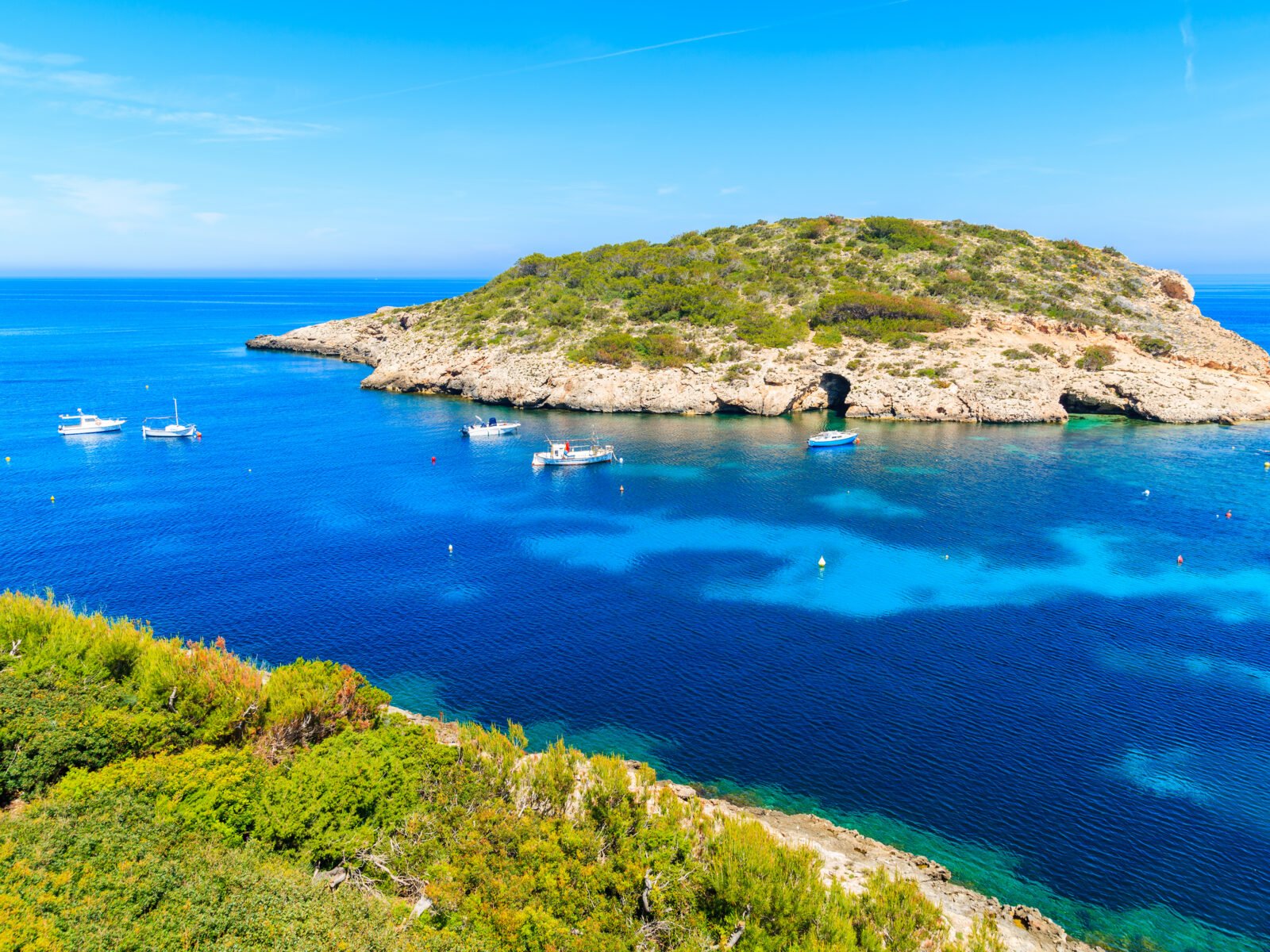 Green,Coast,And,View,Of,Fishing,Boats,On,Sea,In